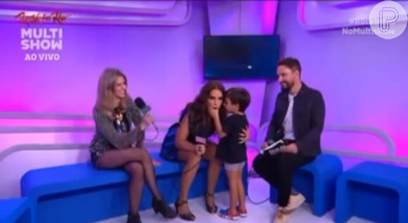 Após a apresentação de Ivete no Rock in Rio, Marcelo apareceu no meio de um entrevista da cantora para dar um beijinho na mamãe