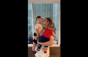 Andressa Suita enche filhos de beijos ao voltar de viagem a trabalho: 'Saudade'