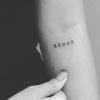 Anitta tem o nome do irmão Renan tatuado no antebraço