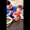 Andressa Suita filma o filho Samuel comendo prato de frango caipira com o pai, Gusttavo Lima