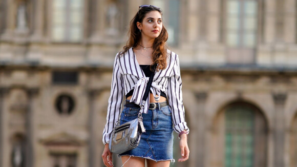 Saia jeans: 5 ideias de blusas que estão na moda para combinar com a peça