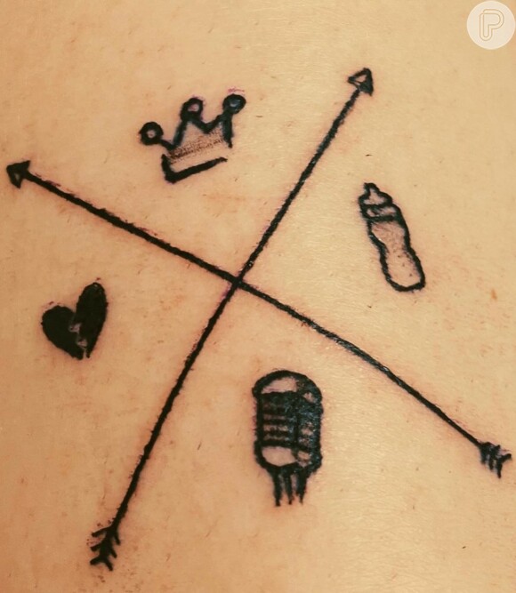 Marília Mendonça também tatuou o símbolo da turnê 'Todos Os Cantos'