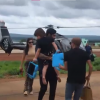 Andressa Suita e Gusttavo Lima desembarcaram de helicóptero com os filhos e logo entraram no jatinho particular do cantor