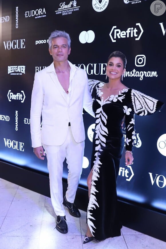Flávia Alessandra e Otaviano Costa combinam looks preto e branco para Baile da Vogue