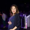 Raquel Ripani mostrou a barriguinha de grávida de seis meses de uma menina durante a estreia do espetáculo 'Fuerza Bruta'