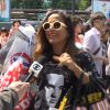 Anitta encerra a matéria do 'Fantástico' cheia de sacolas