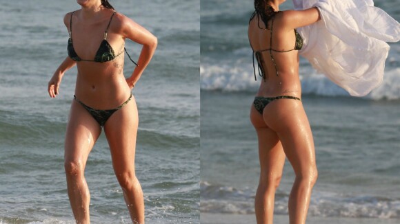 Isis Valverde exibe boa forma de biquíni em praia do Rio de Janeiro. Veja fotos!
