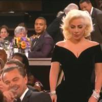 Leonardo DiCaprio se explica por risadas pelas costas de Lady Gaga: 'Não sabia'
