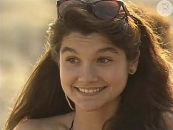 Flávia Alessandra em sua primeira novela, 'Top Model' (1989). Sua personagem  era uma frequentadora assídua da praia