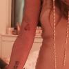 Lindsay Lohan faz nova tatuagem em seu braço direito