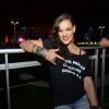 Adriana Birolli foi ao último Rock in Rio com uma camiseta onde estava estampado o nome de sua peça teatral