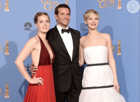 Amy Adams, Bradley Cooper e Jennifer Lawrence: o trio protagonista do filme 'Trapaça'