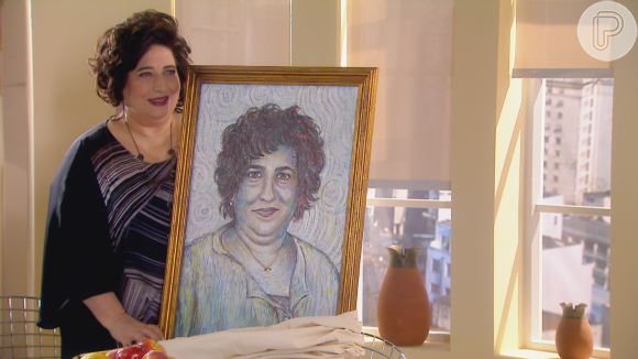 Solange (Cristina Mutarelli) chora ao receber quadro com seu retrato pintado por Silvestre (Blota Filho), na novela 'Carinha de Anjo'