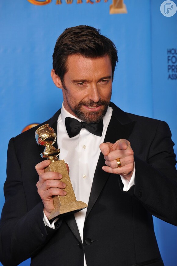 Hugh Jackman recebe o Globo de Ouro de melhor ator em 13 de janeiro de 2013