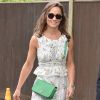 Pippa Middleton, irmã de Kate Middleton, também optou por um vestido com estampa floral para ir ao no torneio de Wimbledon, em Londres, em 16 de julho de 2017