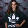 Anitta rebateu a crítica de um colunista sobre a cantora ter cometido um erro ao lançar uma 'bossa em inglês'