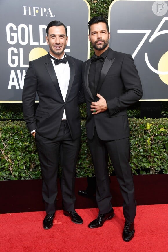 Ricky Martin e o noivo, Jwan Yosef, cruzaram o tapete vermelho da 75ª edição do Globo de Ouro, em Los Angeles, neste domingo, 7 de janeiro de 2018