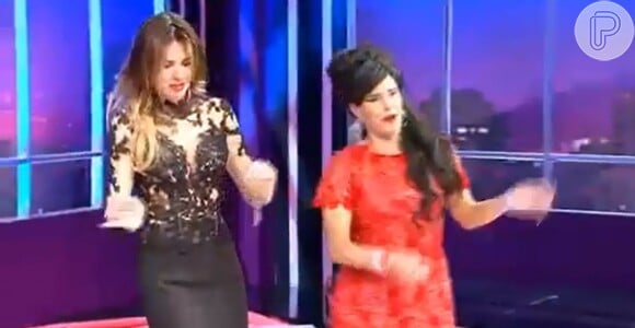 Narciza Tamborindeguy, caracterizada de Amy Winehouse, dança com Luciana Gimenez