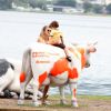 Letícia Birkheuer passeou com o filho na Lagoa Rodrigo de Freitas, Zona Sul do Rio de Janeiro, nesta sexta-feira, 11 de julho de 2014