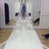 O vestido de casamento de Kim Kardashian ganhou mangas de renda e uma enorme cauda