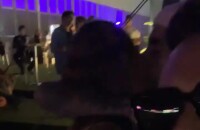Pedro Scooby puxou Cinthia Dicker para um beijo em área VIP do Rock in Rio na noite deste sábado, 5 de outubro de 2019