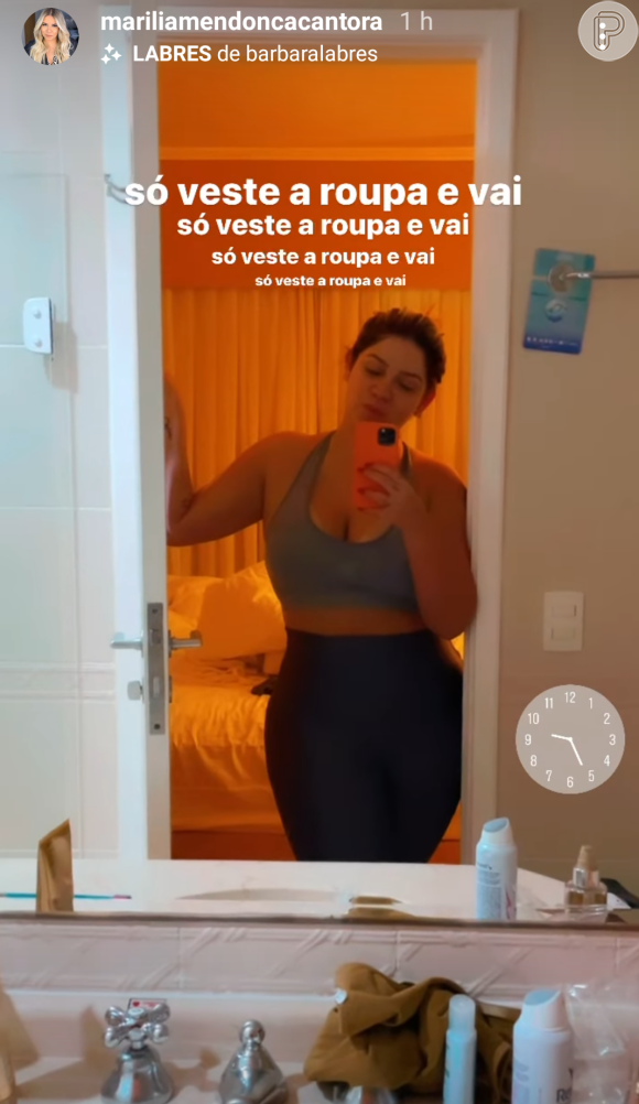 De top, Marília Mendonça deixa barriga de fora em look fitness