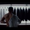 Jamie Dornan aparece se arrumando como Christian Grey no novo teaser do filme 'Cinquenta Tons de Cinza'