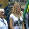 Fiorella Mattheis e Alexandre Pato cantam o Hino Nacional antes da largada do Grande Prêmio do Brasil de Fórmula-1
