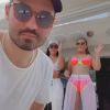Com look neon de moda praia, Maiara dança com a irmã e Fernando Zor