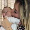 Virgínia Fonseca beija a filha, Maria Alice, e expressão da bebê a diverte: 'Me deixa, mamãe'