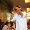 Neymar chega de helicóptero para participar de tarde de autógrafos em um shopping de Campinas, SP, em 14 de março de 2013