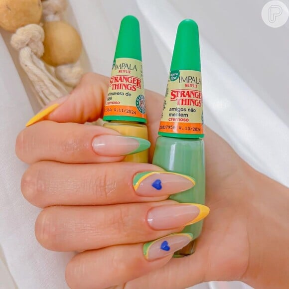 Unhas minimalistas em tom pastel para usar na Copa do Mundo: verde e amarelo se combinam nessa nail art