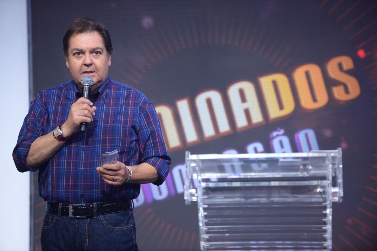 Foto Faustão sua assistente de palco durante do 'Dominção' ' Foto Faustão sua assistente de palco durante do 'Dominção' '