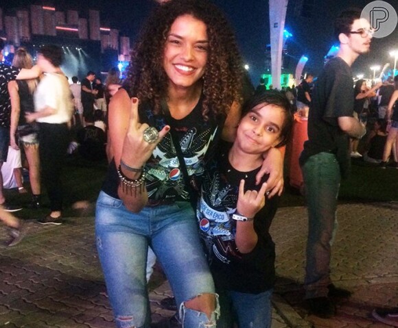 Kizi Vaz levou o filho Pedro Luiz, de 7 anos, para o curtir o sábado (19), no Rock in Rio