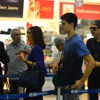 Fátima Bernardes usa bolsa de R$ 8,3 mil ao embarcar em aeroporto. Fotos!