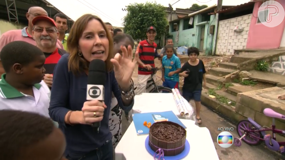 Susana Naspolini, repórter do 'RJTV', também já comeu bolo com os moradores locais