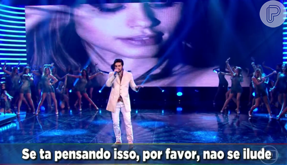 Luan Santana cantou no palco do programa e, ao mesmo tempo, o clipe foi exibido num telão
