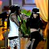 A cantora dividindo os palcos com Lil Wayne no Billboard Music Awards de 2013