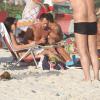 Grávida de um mês de Malvino Salvador, Kyra Gracie curte sol com o ator em praia do Rio de Janeiro