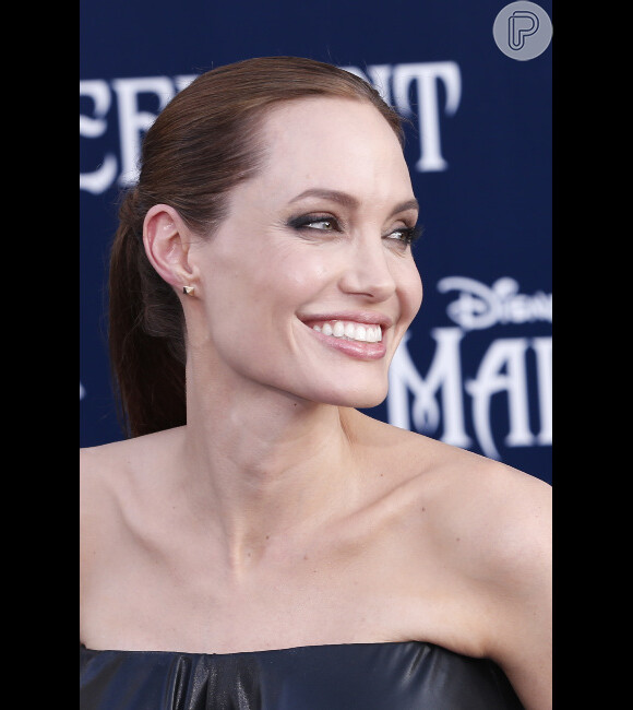 Angelina Jolie conta que seus filhos ficaram com medo quando a viram caracterizada para o filme 'Malévola'