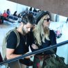 Bruno Gagliasso e Giovanna Ewbank embarcam juntos no aeroporto Santos Dumont, no Rio de Janeiro, em 29 de maio de 2014