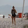 Grazi Massafera mostrou muita disposição ao correr na areia fofa da praia da Barra da Tijuca nesta quinta-feira, 24 de julho de 2014. Com um corpão invejável, a atriz chamou a atenção dos banhistas