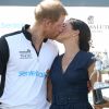 Príncipe Harry e Meghan Markle quebraram protocolo ao trocarem beijos após assistirem ao jogo beneficente da Copa Sentebale ISPS Handa Polo, em Windsor, na Inglaterra, nesta quinta-feira, 26 de julho de 2018