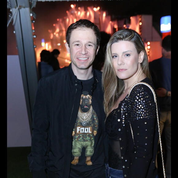 Tiago Leifert e a mulher, Daiana Garbin, prestigiaram o primeiro dia de Rock in Rio