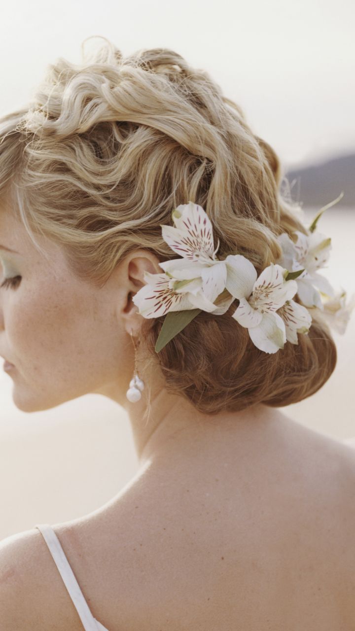 Penteado para casamento: hairlook para noiva com flores