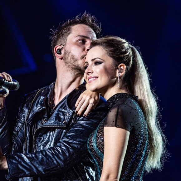 A mais recente mudança radical de Sandy foi para a turnê com o irmão, Junior, em 2019