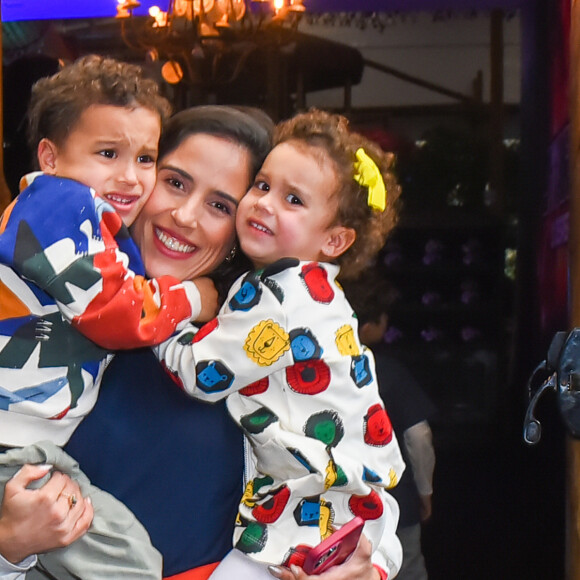 Camilla Camargo foi à festa do sobrinho na companhia dos filhos