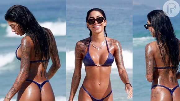De biquíni micro, a irmã de Gabigol, Dhiovanna Barbosa exibiu corpo todo tatuado em dia na praia no Rio de Janeiro em 3 de agosto de 2023