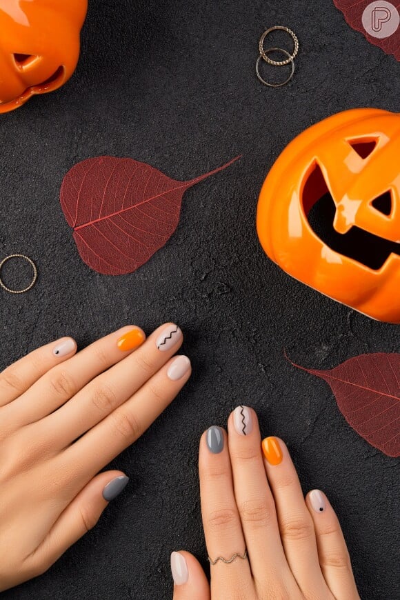 Unhas com nail art minimalista para o Halloween: que tal se inspirar nessa opção?