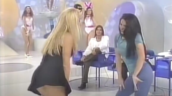 Em 1997, essa cantora internacional aguardada no Brasil estava bem diferente e aprendendo a 'Dança da Bundinha' no SBT. Reconhece?
